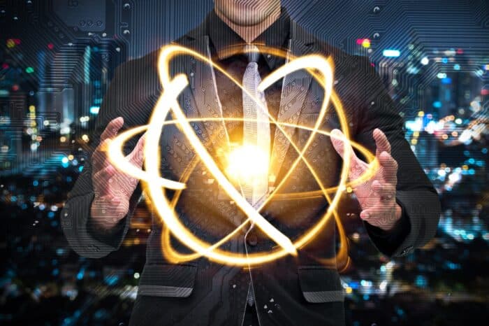 Quantum,computer,technology,concept.,man,in,suit,holding,science,yellow