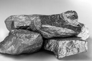 Raw,manganese.,manganese,stone,isolated,on,white,background.,mineral,extraction